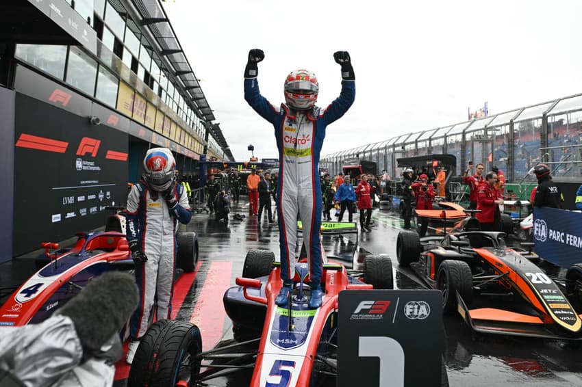 Team Trident's Brazilian driver Rafael Camara celebrates victory after the Australian Formula 3 Grand Prix at the Albert Park Circuit in Melbourne on March 16, 2025. (Photo by Paul Crock / AFP) / --IMAGE RESTRICTED TO EDITORIAL USE - STRICTLY NO COMMERCIAL USE