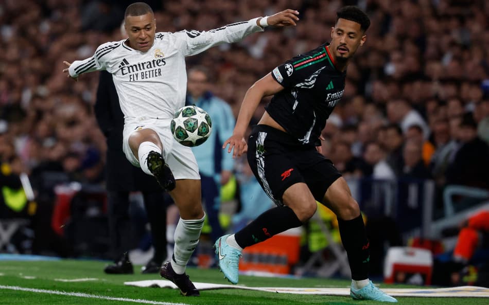 AFP__20250416__42KW33A__v1__HighRes__FblEurC1RealMadridArsenal-scaled-aspect-ratio-512-320