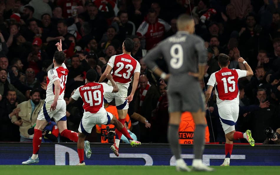 Jogadores-do-Arsenal-comemoram-gol-contra-o-Real-Madrid-em-jogo-valido-pela-Champions-League-aspect-ratio-512-320