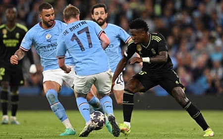 AFP__20230517__33FF2KU__v1__HighRes__FblEurC1ManCityRealMadrid-scaled-aspect-ratio-512-320