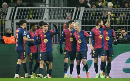 AFP__20241211__36Q88T9__v1__HighRes__FblEurC1DortmundBarcelona-scaled-aspect-ratio-512-320