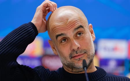 AFP__20250218__36Y62XN__v1__HighRes__FblEurC1ManchesterCityPresser-scaled-aspect-ratio-512-320