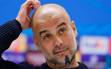 Guardiola disse em coletiva que o time do Manchester City não merece premiação (Foto: OSCAR DEL POZO / AFP)