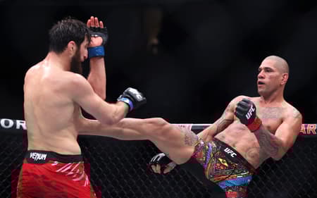 AFP__20250309__2204069434__v2__HighRes__Ufc313PereiraVAnkalaev-scaled-aspect-ratio-512-320
