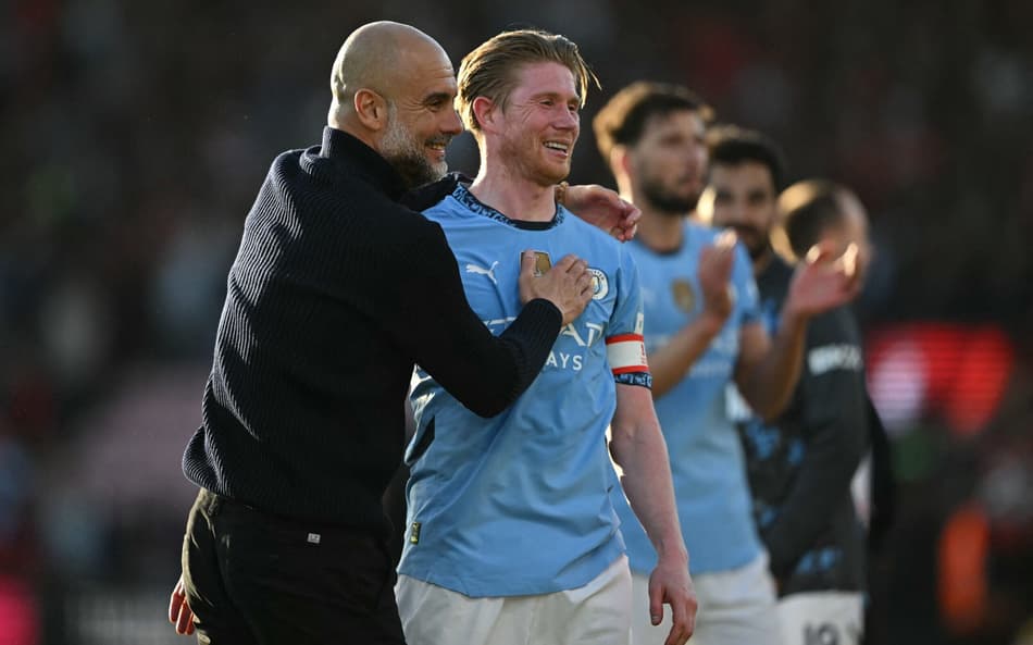 Guardiola-comemora-com-De-Bruyne-classificacao-do-Manchester-City-na-FA-Cup-scaled-aspect-ratio-512-320
