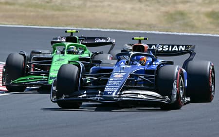 gabriel-bortoleto-carlos-sainz-gp-japao-scaled-aspect-ratio-512-320