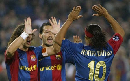 puyol-zambrotta-ronaldinho-aspect-ratio-512-320